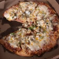 A fresh, loaded Stageline pizza
